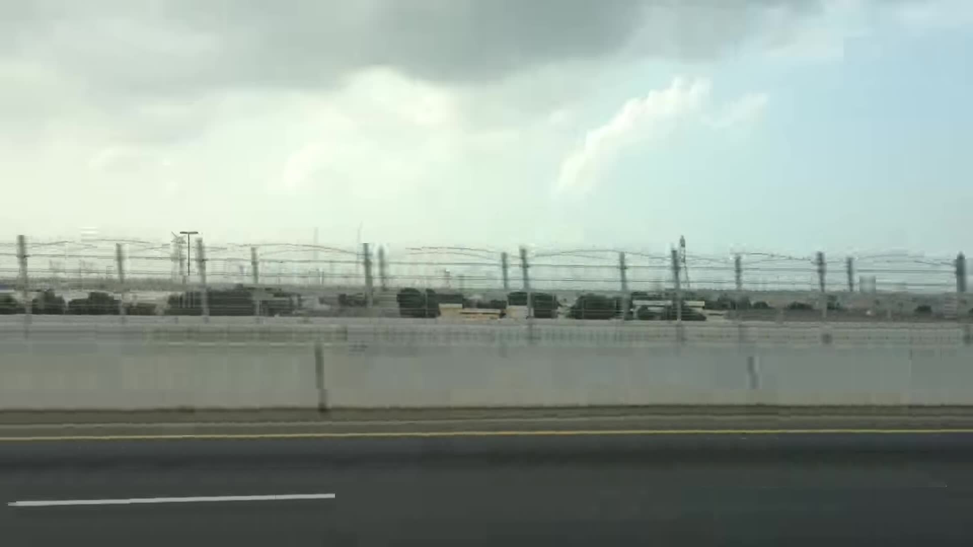 Urban bus corridor along a wide Gulf city avenue