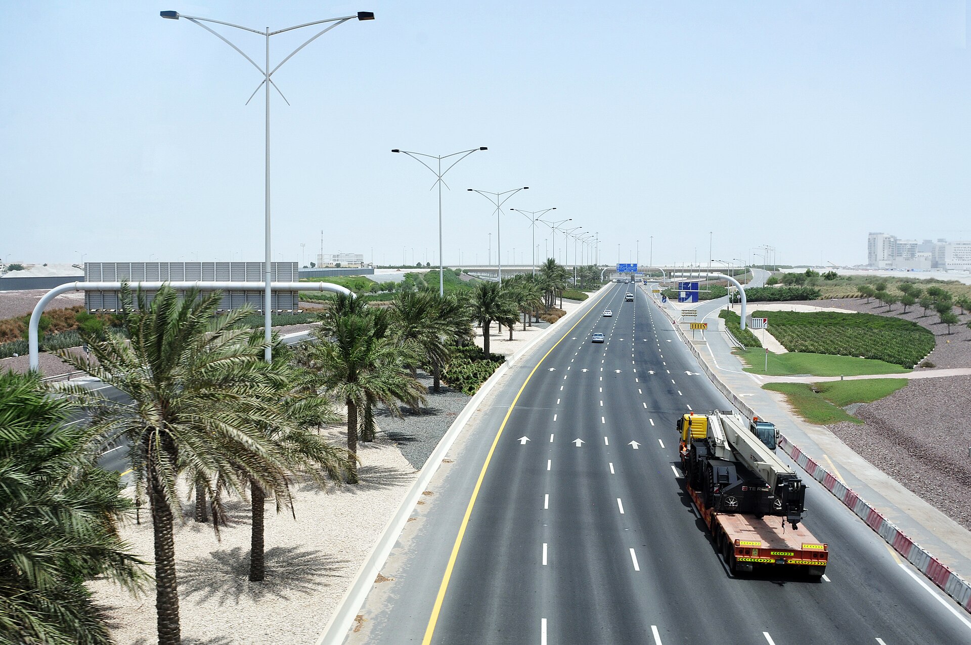 Reem Island marina and coastal towers along channel water